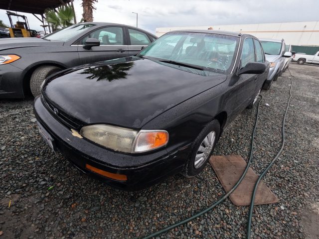 Vehicle: 1996 TOYOTA CAMRY (Lot 99)